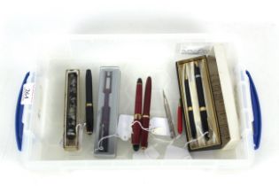 A boxed Sheaffer fountain pen and propelling pencil, a Parker fountain pen and five various other