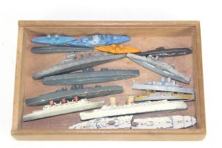 A box of model battleships and cruise liners including Dinky