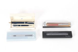 A cased pair of Platignum pens and three various o