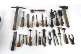 A quantity of tools including hammers, small brace, curling tongs, glass cutters, screw drivers