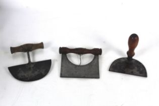 Three vintage herb cutters