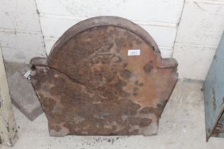 An antique cast iron fireback AF