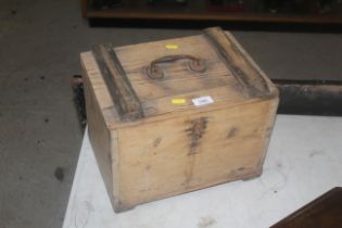 A small pine storage box with metal handle to top
