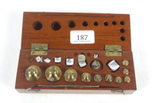 A cased set of laboratory weights