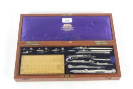 A W.H. Harling mathematical instrument set in wood