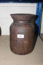 A wooden tribal pot