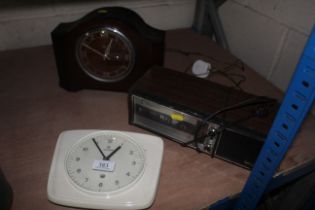 Three various vintage clocks including a clock rad