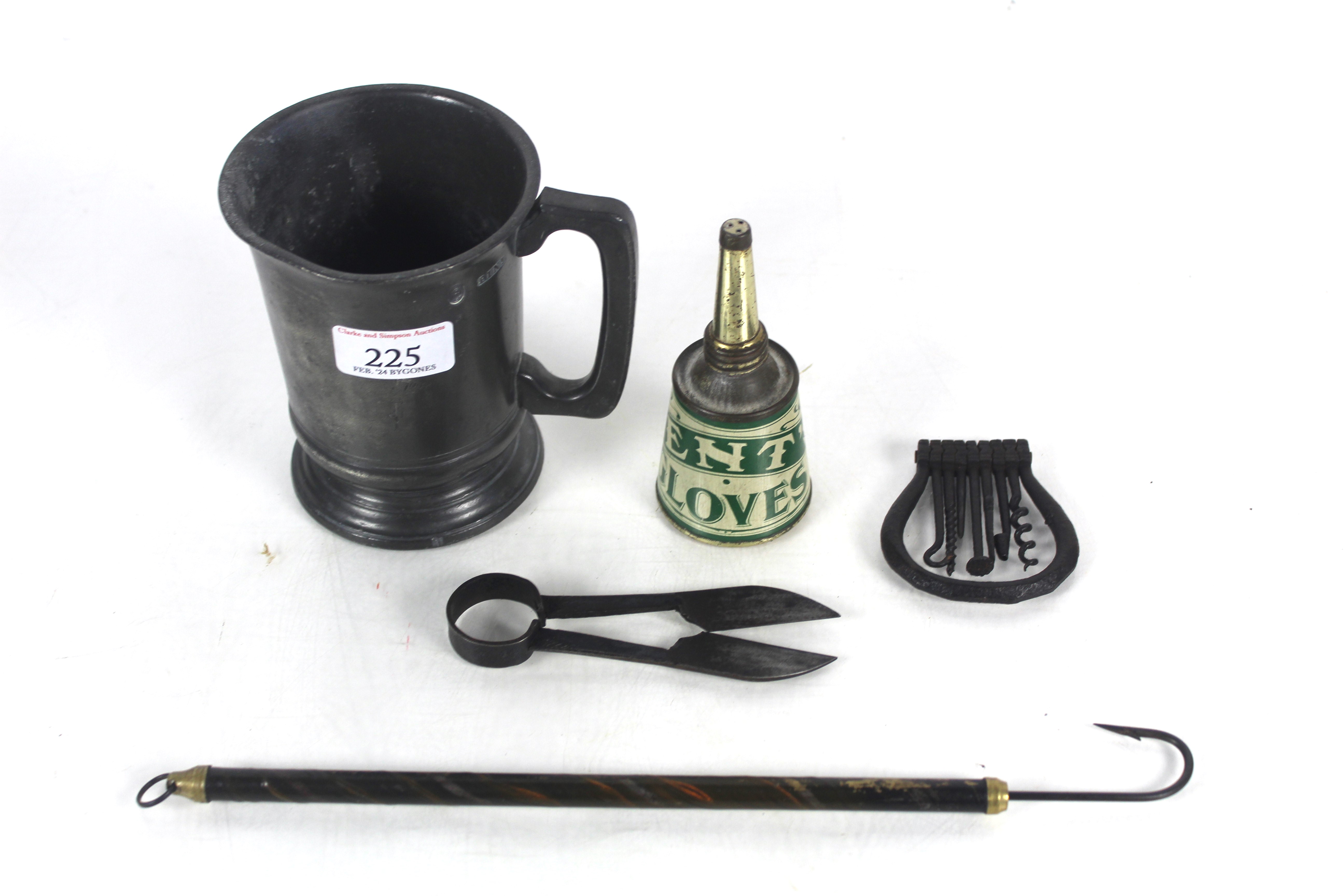 A small collection of antique metal ware including a pewter tankard, 18th Century steel pocket multi