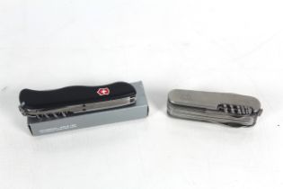 A Swiss Victorinox boxed pen knife and a Eurohike multi tool pen knife