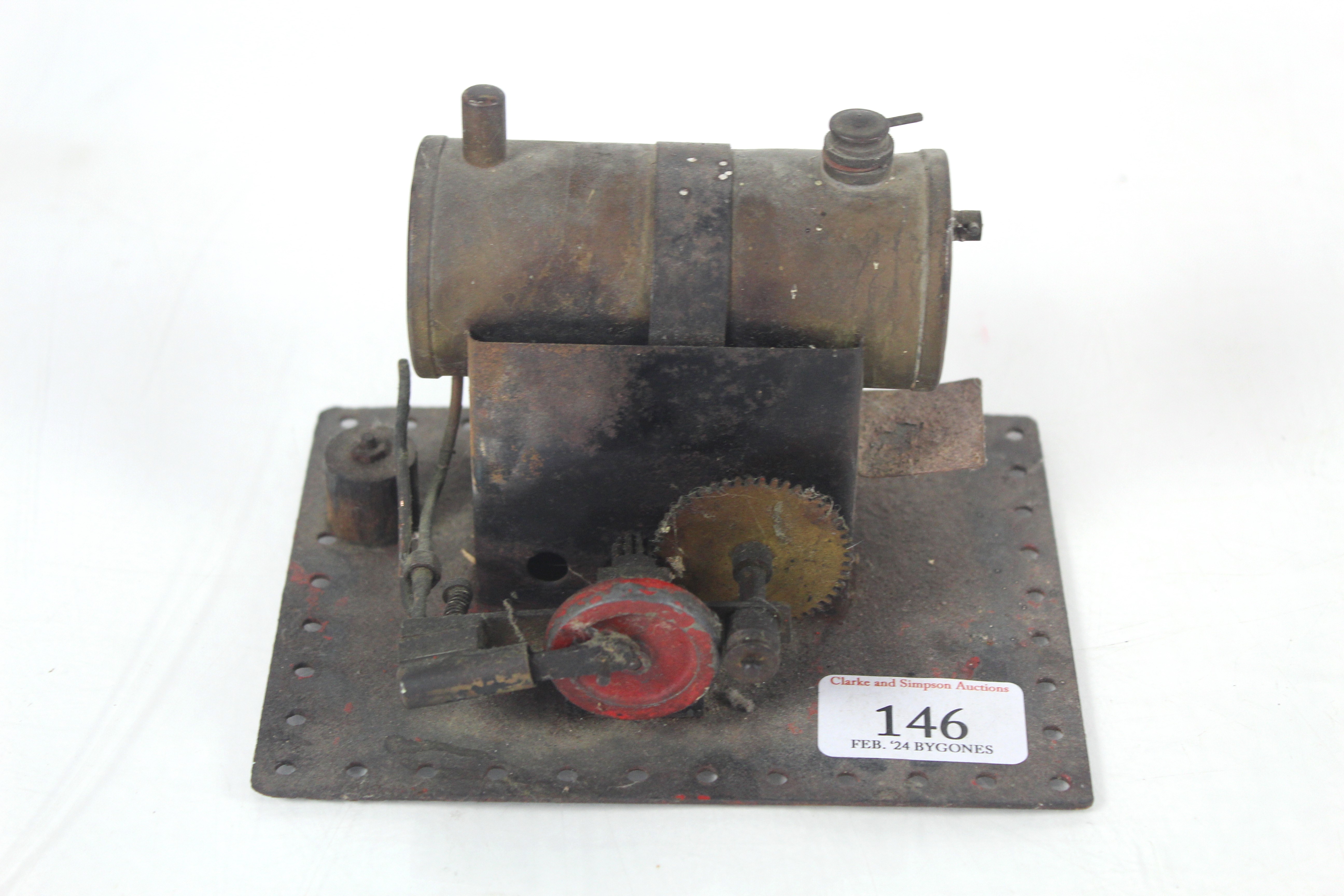 A small model steam engine with pulley wheel (no b