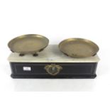 A small box base wooden and brass counter scale with marble top to base