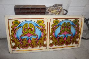 A decorative fairground panel, approx. 69" x 34"