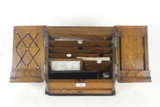 A Victorian oak stationery box