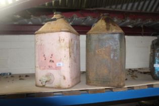 A Pink Paraffin can with further oil can