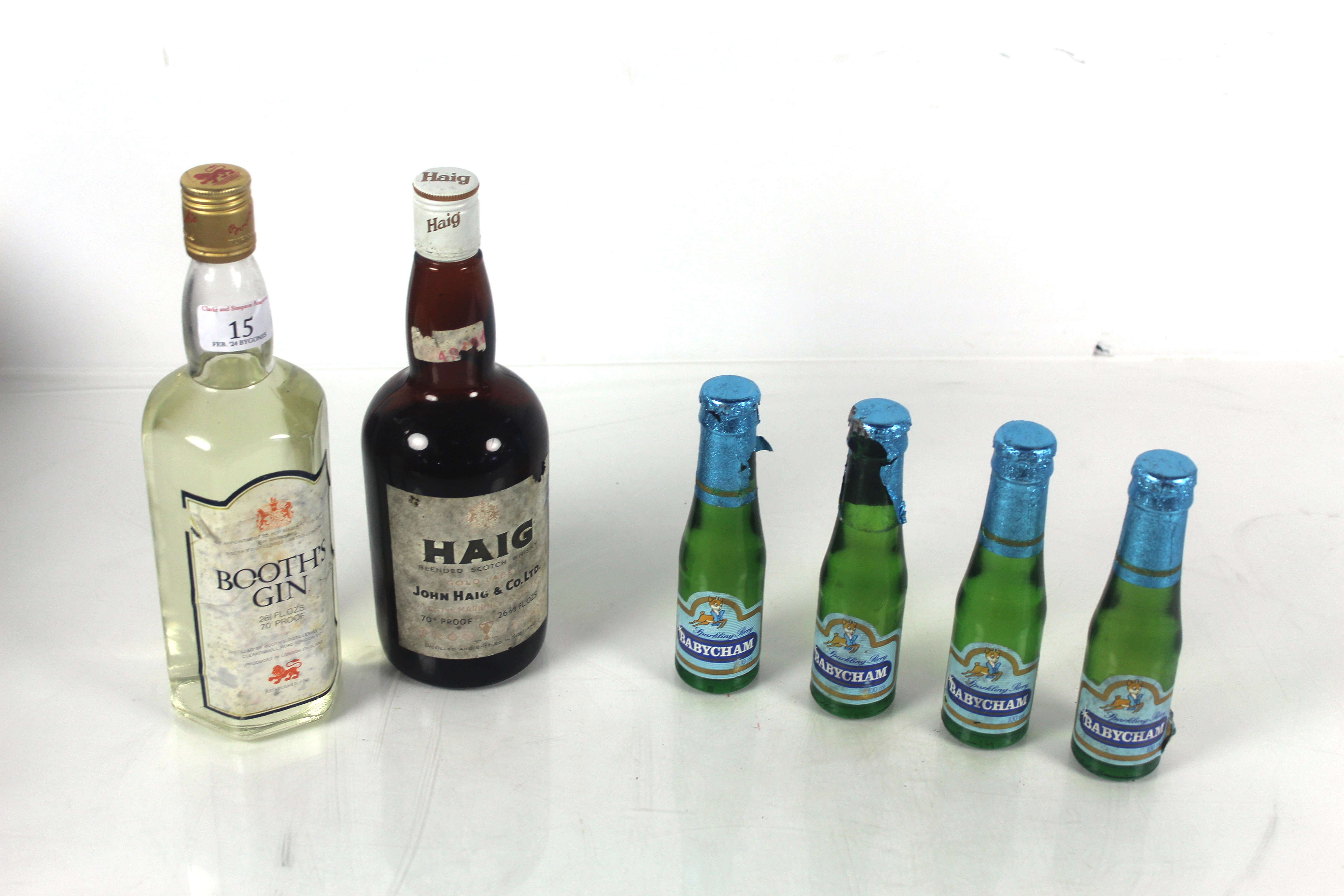 Four bottles of Babycham, one bottle of Haig Whisk