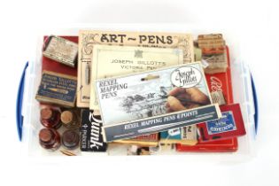 A box containing pen ink, steal pen nibs etc.