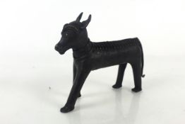 A bronze figure of a donkey