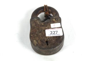 A large metal padlock with key