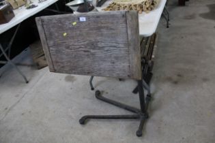 A wooden adjustable lectern / site managers table