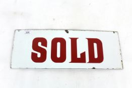 A white and red enamel sign "Sold", approx. 19½" x