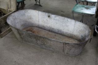 A galvanised tin bath