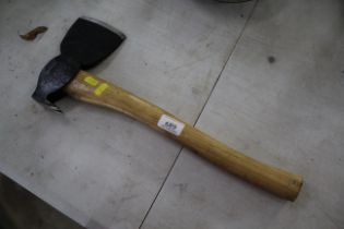 A small hand axe with nail pulling end