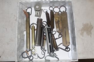 A box containing various cylinder and other balanc