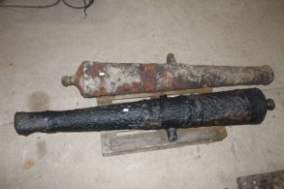 A period cast iron cannon barrel, approx. 96" long overall. Vendor reports recovered from the