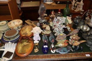 A quantity of various bird ornaments; a Toby style jug; Staffordshire style ornaments; fish and