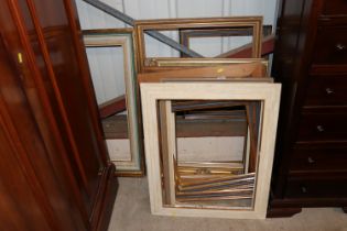 A quantity of various picture frames
