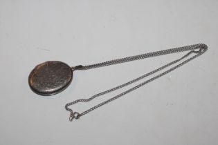 A large vintage sterling silver locket, approx. 17