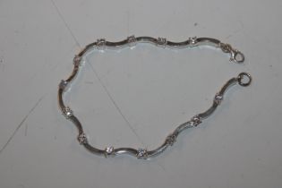 A sterling silver and cubic zirconia tennis style