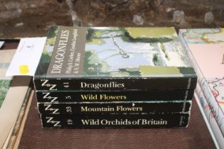 Four volumes of The New Naturalist paperbacks, "Wi