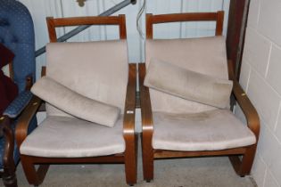 A pair of IKEA bentwood armchairs