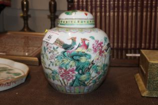 A Chinese ginger jar and cover decorated with bird