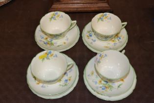 Four Royal Doulton floral patterned trios