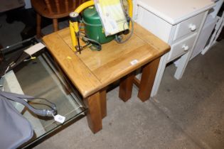 An oak nest of two occasional tables