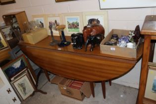 A teak drop leaf table approx. length 163cms