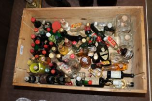 A wine box and contents of various miniatures