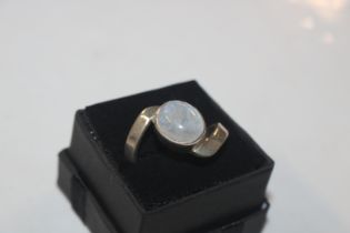 A sterling silver and moonstone set ring, ring size S/T, approx. 6gms