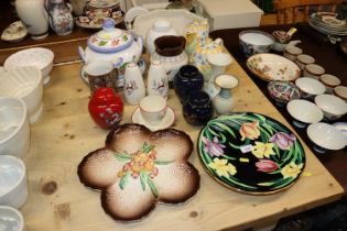 A quantity of various china to include Belleek vase, Crown Devon salt and pepper pots, Newhall