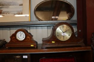 An Edwardian inlaid mantel clock together a walnut