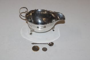A silver sauce boat, approx. 103gms; a silver cond