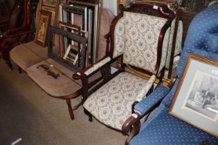 A 19th Century upholstered wing back armchair