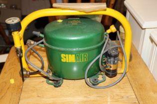 A Simair artists compressor for air brushing