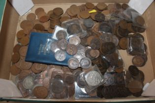 A box of various copper and other coinage