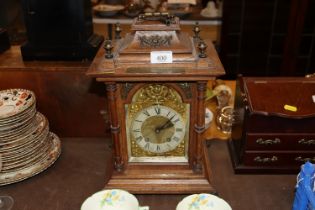 A Lenzkirch oak cased two hole clock with presenta