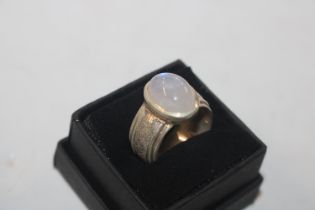 A wide band sterling silver and moonstone ring, ring size P/Q, approx. 11gms