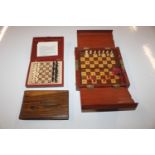 A K & C travelling chess set; a wooden folding tra