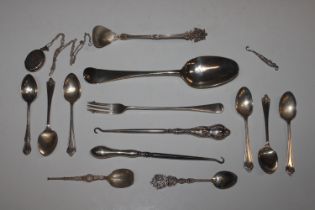 A silver pickle fork; a collection of various silv